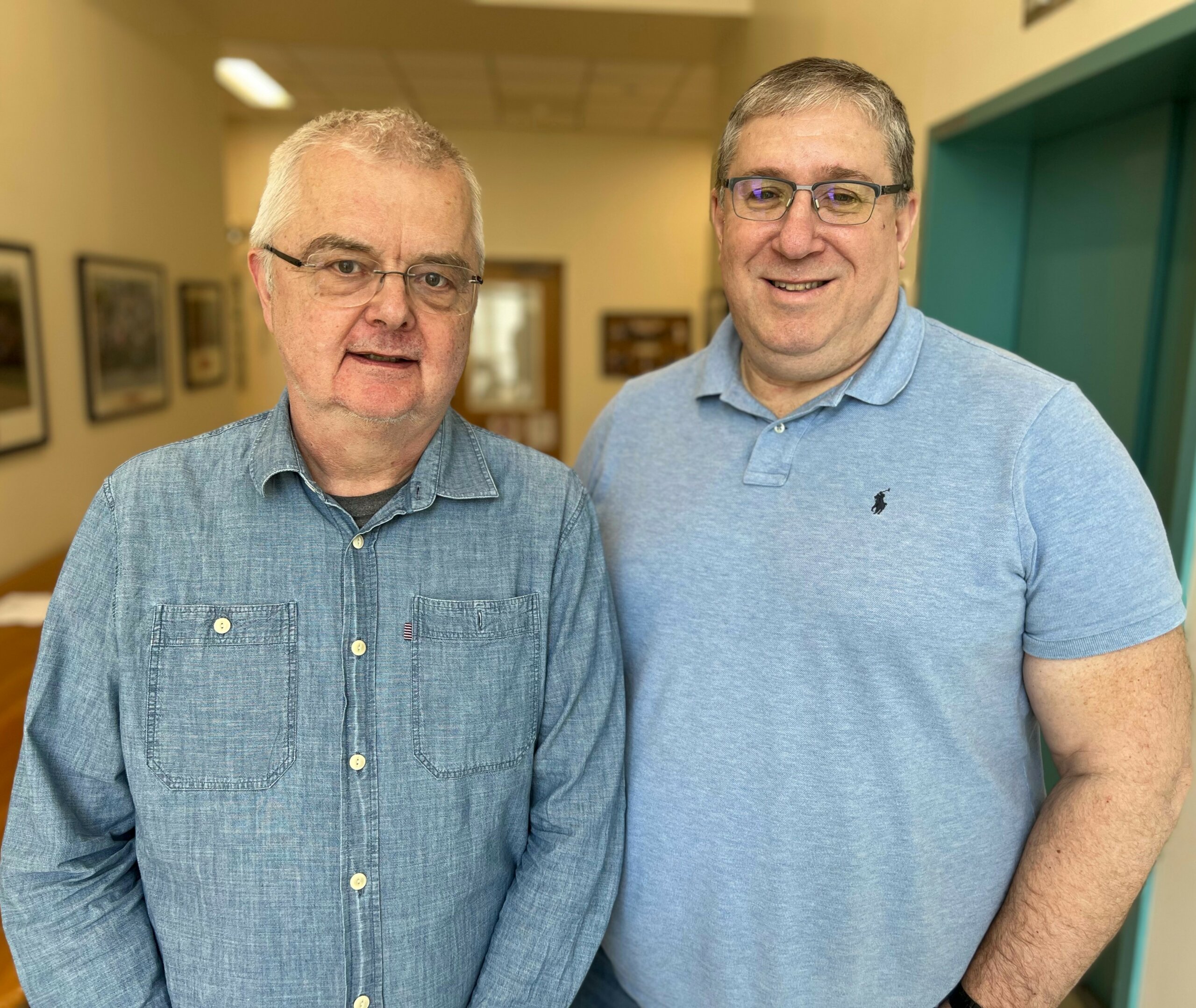 Drs. Jochen Buck and Lonny Levin smiling at the camera