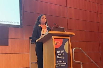 Leah Simon speaking at a lectern at the 2024 SSR Conference