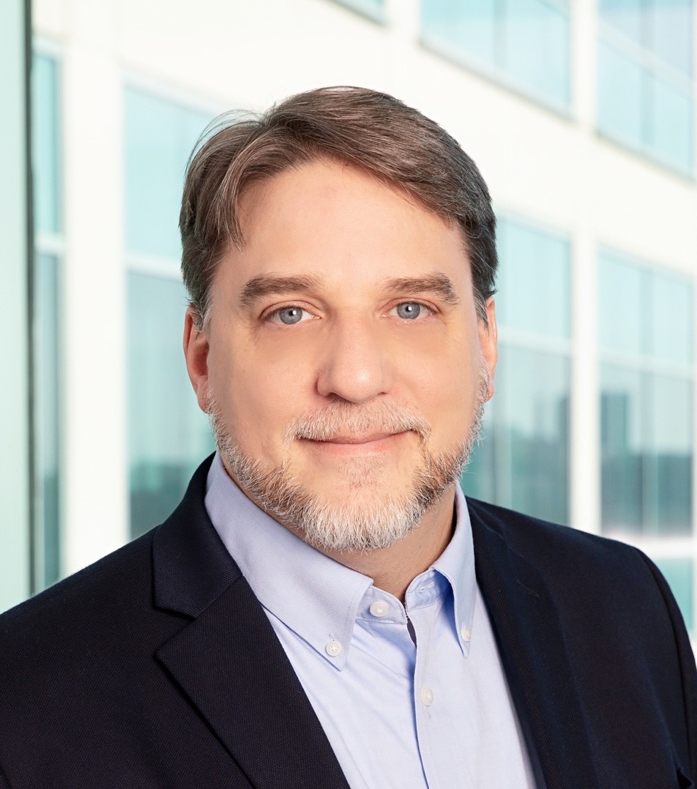 Portrait photograph of doctor Lee Kraus looking at the camera